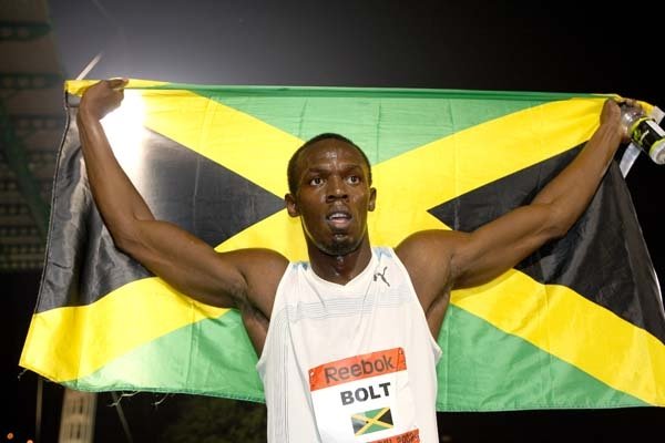 BOLT SHATTERS RECORD AGAIN 9.58